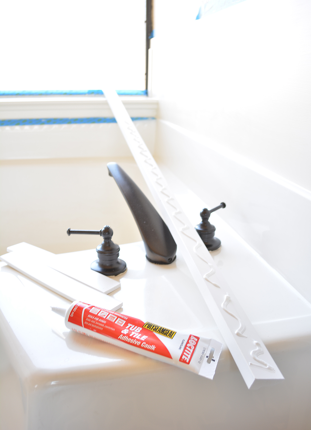 Inexpensive Tub Update with Decorative Moulding