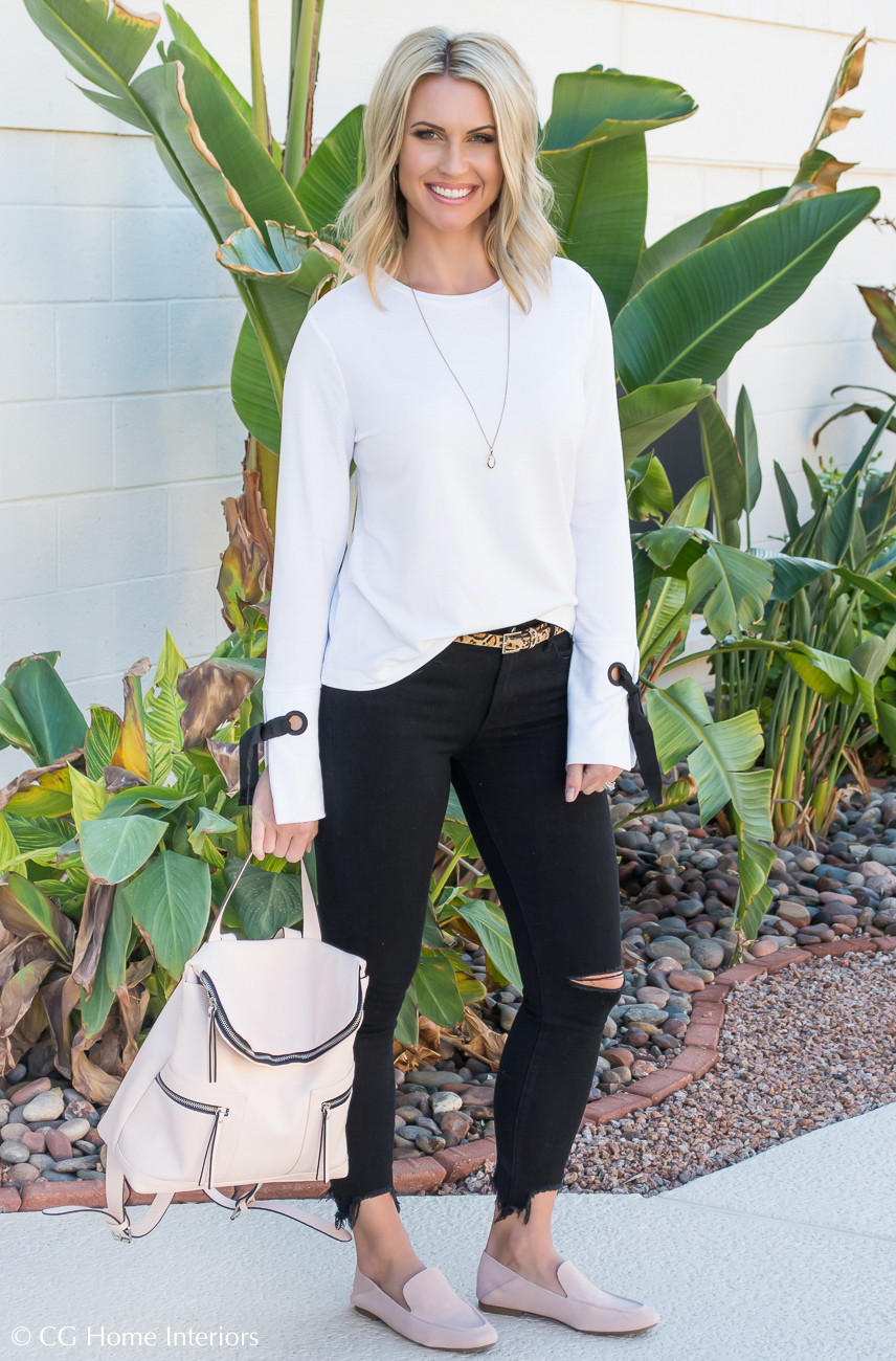 Black jeans, blush handbag, blush shoes